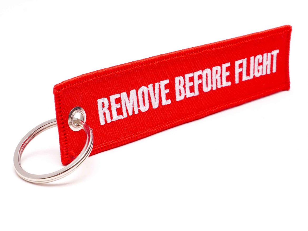 REMOVE BEFORE FLIGHT Schlüsselanhänger artikelmitlogo.de