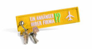 Gelbe Werbeartikel Schlüsselanhänger mit Logo